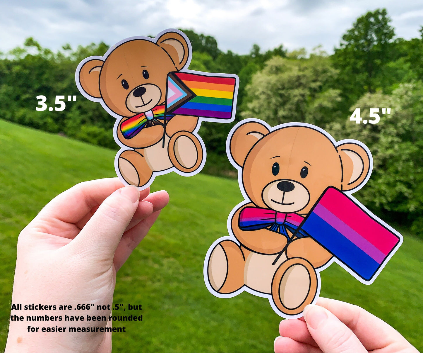 A 3 1/2 inch and 4 1/2 inch sticker are shown held up next to each other for comparison. The 3 1/2 inch sticker has a progressive pride flag, the bow tie is rainbow with the center and dangles being the trans colors, brown, and black of the progressive part. The 4 1/2 inch sticker has a bisexual flag with a matching gradient bow tie. A note says all stickers are .666 inch not 1/2 inch but the number have been rounded for easier measurement.