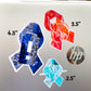  3 Stickers are shown on a silver laptop.