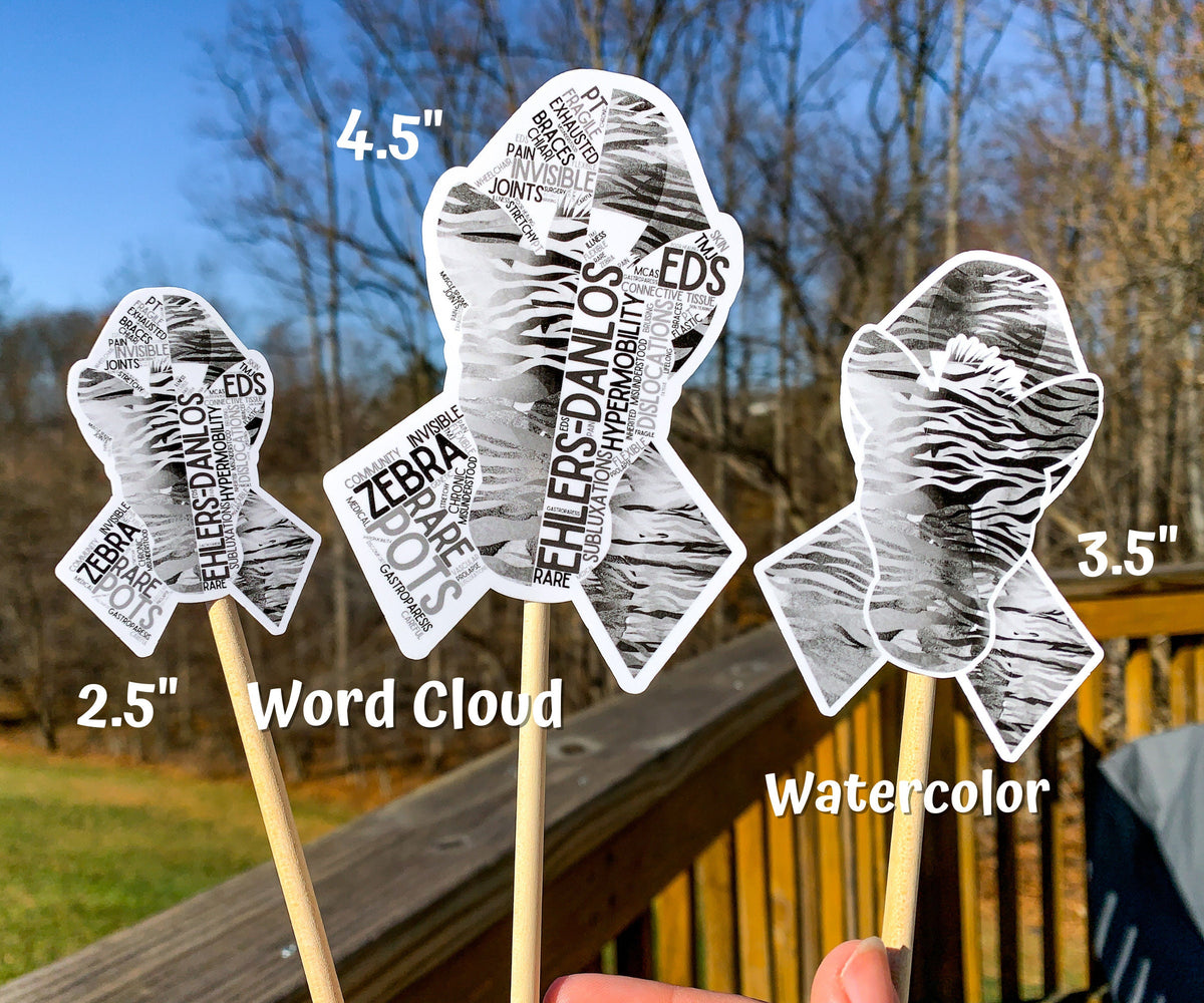 3 sizes of the stickers are shown. 2.5 inch, 4.5 inch, and 3.5 inch. It also shows that the watercolor design is all color and no word cloud and the word cloud is the design with each section split in half with the word clouds. 